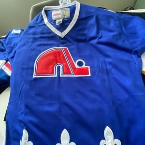 CCM Blue Jersey with Red and White Accents